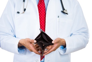 Closeup portrait of poor doctor showing empty wallet, isolated on white background