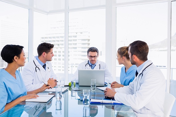 Concentrated medical team around desk in the office